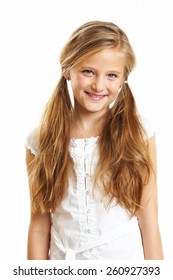 Ten Year Old Caucasian Girl With Long Hair Posing Isolated On White.