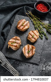 Tender Boneless Grilled Pork Chops. Steak Tenderloin. Black Background. Top View