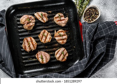 Tender Boneless Grilled Pork Chops. Steak Tenderloin. Gray Background. Top View