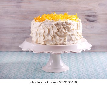 Tender lemon cake with candid lemon on stand plate