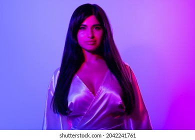 Tender Look. Youth Culture. Portrait Of Young Beautiful Girl Isolated Over Gradient Background In Neon Lights. Model Wearing Silk Fashionable Dress. Concept Of Human Emotions, Facial Expression, Ad