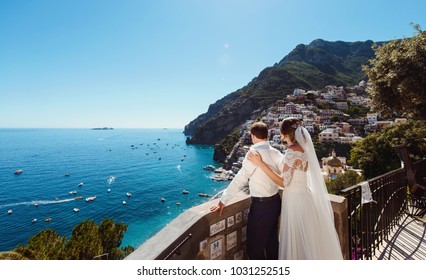 Tender Romantic Young Couple In Honeymoon In Positano, Amalfi Coast, Italy