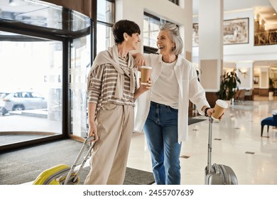 A tender senior lesbian couple standing together, expressing love. - Powered by Shutterstock