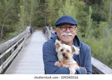 Tender senior man and his small dog - Powered by Shutterstock