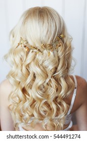 Tender Wedding Hairstyle With Accessories. Long Blond Curly Hair. Messy Hair.