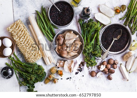 Tenderstem broccoli, black quinoa, black rice with Vegan ingredients for cooking. Asian style ingredients for cooking. 