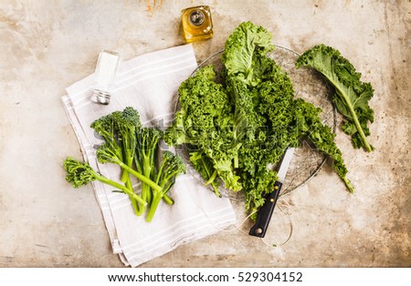 Tenderstem broccoli and kale cabbage leaves. Top view.