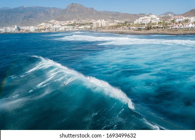 Tenerife, Canary Island, Spain Man Surfing On A Large Wave On Playa De Las Americas On The Coast Of Atlantic Ocean, Tenerife Surfers Ride The Waves