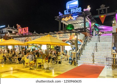 Tenerife, Canary Islands - November 30, 2018: Nightlife In The Bars And Terraces Of A Modern Shopping Center In The Tourist City Of Playa De Las Americas