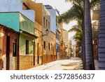 Tenerife. Colourful houses and palm trees on street in Puerto de la Cruz town, Tenerife, Canary Islands, Spain.