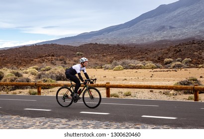 Tenerife, Spain December 24. 2018: Men Cycling Road Bike In The Teide National Park. Spain