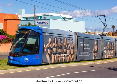 Tenerife, Spain - September 22, 2022: Modern Alstom Citadis 302 Light Rail Tram On Line L1 At Gracia Stop With Intimissimi Ad Public Transport On Tenerife, Spain.