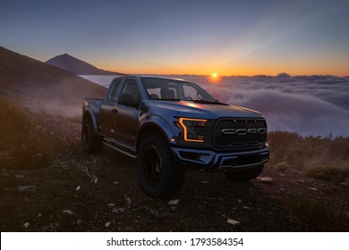 Tenerife,Spain-May 2018:Ford Raptor standing on the slope of the volcano above the cloud