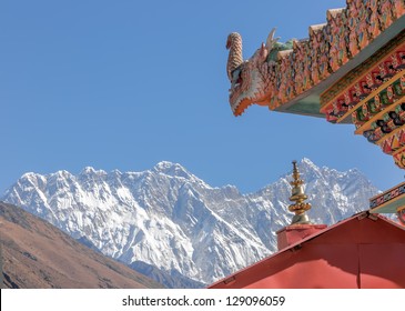 TENGBOCHE, NEPAL - OCTOBER 30: A mythical dragon guards the gate (right). Festival of Tengboche Monastery Practice and Masked Mani Rimdu Dances to the Khumbu region on October 30, 2012 in Tengboche