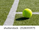 tennis background Close-up shots of tennis balls in tennis courts With a mesh as a blurred background And the light shining on the ground makes the image beautiful wimbledon 2025 Wimbledon Championsh