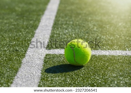 tennis background Close-up shots of tennis balls in tennis courts With a mesh as a blurred background And the light shining on the ground makes the image beautiful wimbledon 2023  Wimbledon Championsh