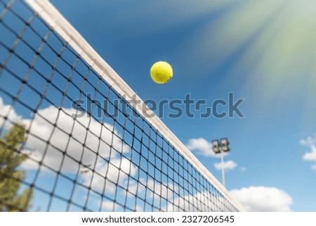 tennis background Close-up shots of tennis balls in tennis courts With a mesh as a blurred background And the light shining on the ground makes the image beautiful Wimbledon Championships