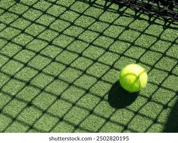  tennis ball back light shadow on tennis grass court good for background - Powered by Shutterstock