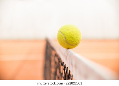 Tennis Ball Hitting The Net