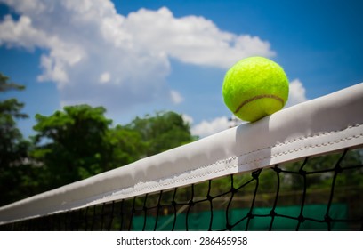 Tennis Ball Hitting The Net