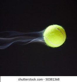 Tennis Ball Moving Fast Giving Illusion Of Smoke Behind It.
