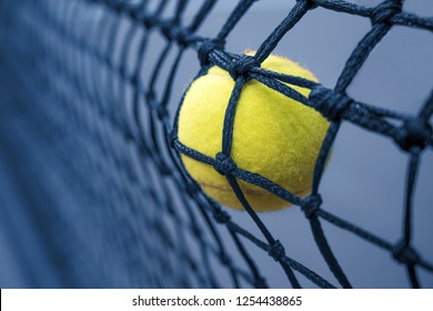 Tennis Ball In The Net