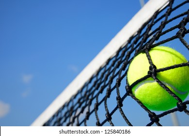 Tennis Ball In Net