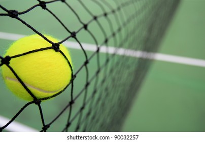 Tennis Ball In Net