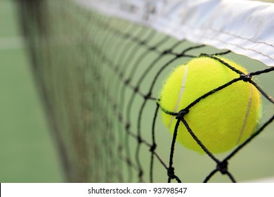 Tennis Ball In Net