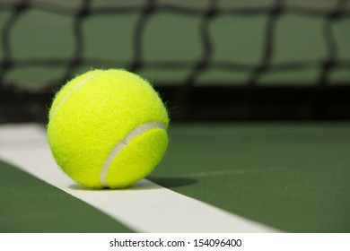 Tennis Ball On The Court Close Up