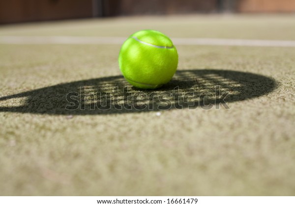 tennis ball and\
shadow