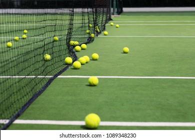 Tennis Balls An Net During Tennis Lesson