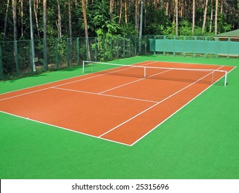 Tennis court in coniferous wood - Powered by Shutterstock