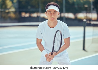 Tennis, fitness and portrait of sports Asian man with training, exercise and workout in outdoor tennis court. Mindset, vision and wellness male ready for practice, training or match. - Powered by Shutterstock