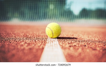Tennis game. Tennis ball on the tennis court. Sport, recreation concept - Shutterstock ID 724092679