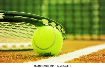 Tennis game. Tennis ball and racket on court background