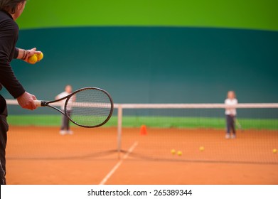 Tennis Instructor During His Work