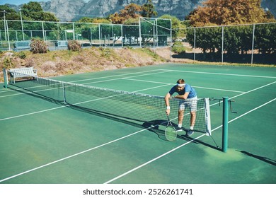 Tennis, man and tired player at net with competition loss, fitness and exhausted at outdoor match. Sports, fatigue and frustrated athlete on court for workout, exercise and challenge in summer games - Powered by Shutterstock