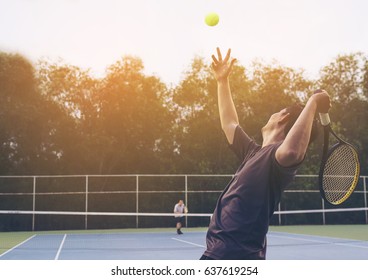 Tennis match which a serving player - Powered by Shutterstock