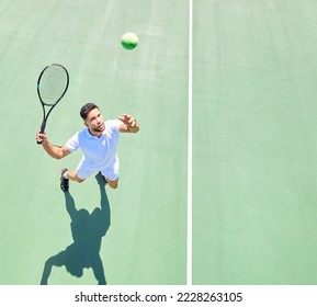 Tennis, mockup and serve with a sports man playing a game on a tennis court outoor from above. Fitness, sport and exercise with a male tennis player hitting a ball during a game or match outside - Powered by Shutterstock