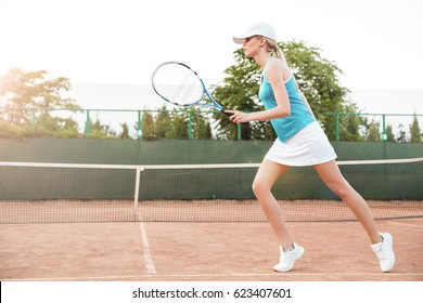 Tennis Model In Profile. Full Length Portrait