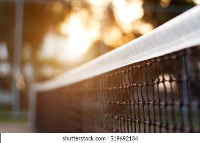 Tennis Net With Bokeh Nature In The Background