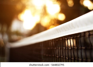 Tennis Net With Bokeh Nature In The Background.soft Focus