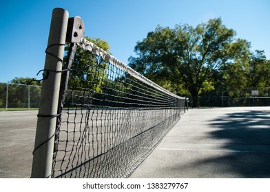 Tennis Net And Court In A Public Park