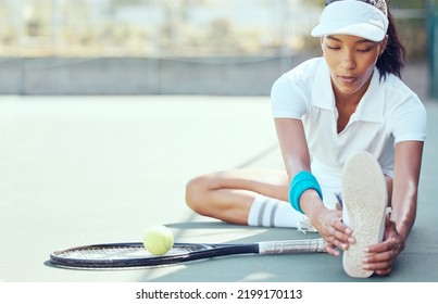 Tennis player, exercise and competitive sport with a woman stretching to prepare for a game or match on an outdoor court. Fitness with a female player sitting and doing warmup workout and practice
