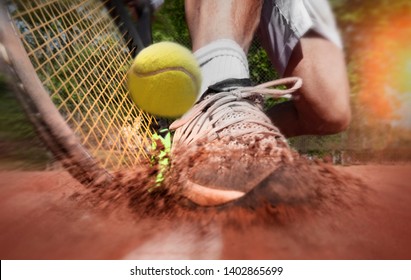 Tennis player on clay tennis court - Powered by Shutterstock