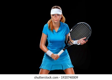 Tennis player with racket in blue costume. Woman athlete playing on black background.