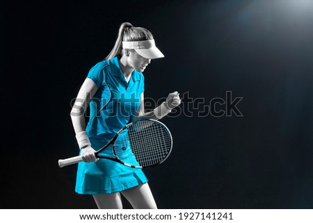 Tennis player with racket in blue costume. Woman athlete playing on grand arena background.