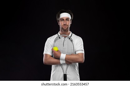 Tennis player with racket in white costume. Man athlete playing isolated on black background. - Powered by Shutterstock