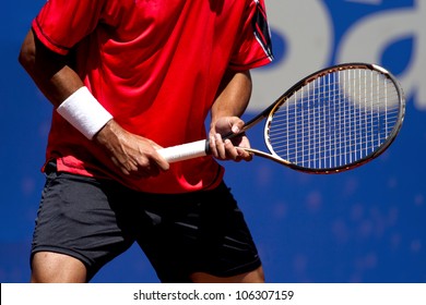 A tennis player waiting for a serve during a match - Powered by Shutterstock